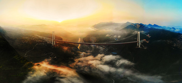 李骁摄·古蔺县赤水河红军大桥  主塔高度创世界之最，连接川黔两地。赤水河红军大桥坐落于川黔交界的乌蒙山区和中国工农红军“四渡赤水”的革命老区古蔺县太平镇叉角村，是世界山区峡谷同类型桥梁中第一高塔，同时也是国内山区峡谷同类型桥梁第二跨度的钢桁梁悬索桥。横跨赤水河（赤水河下游地区），其所在的太平古镇是国家历史文化名镇。.jpg